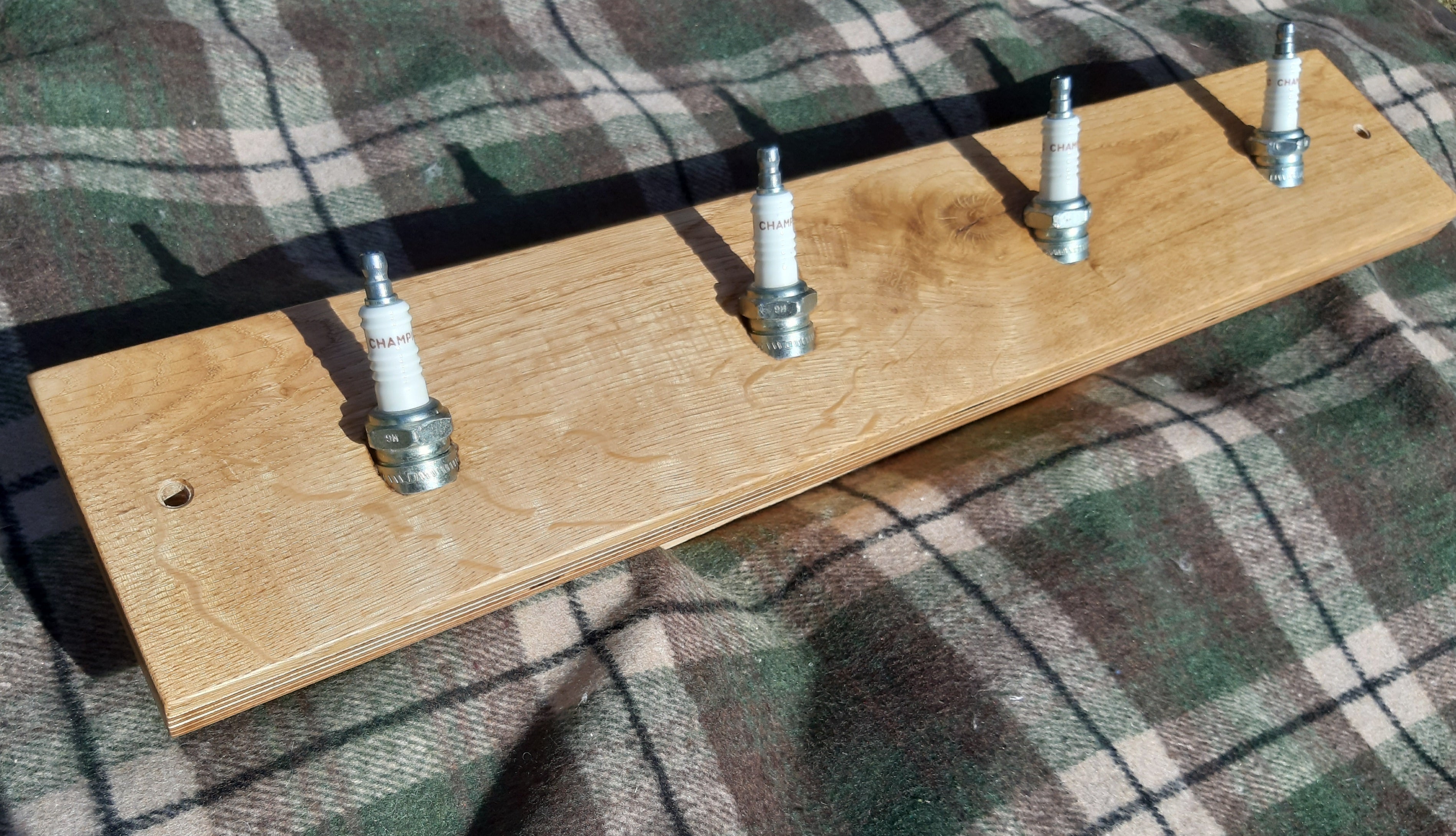 Spark plug coat discount rack